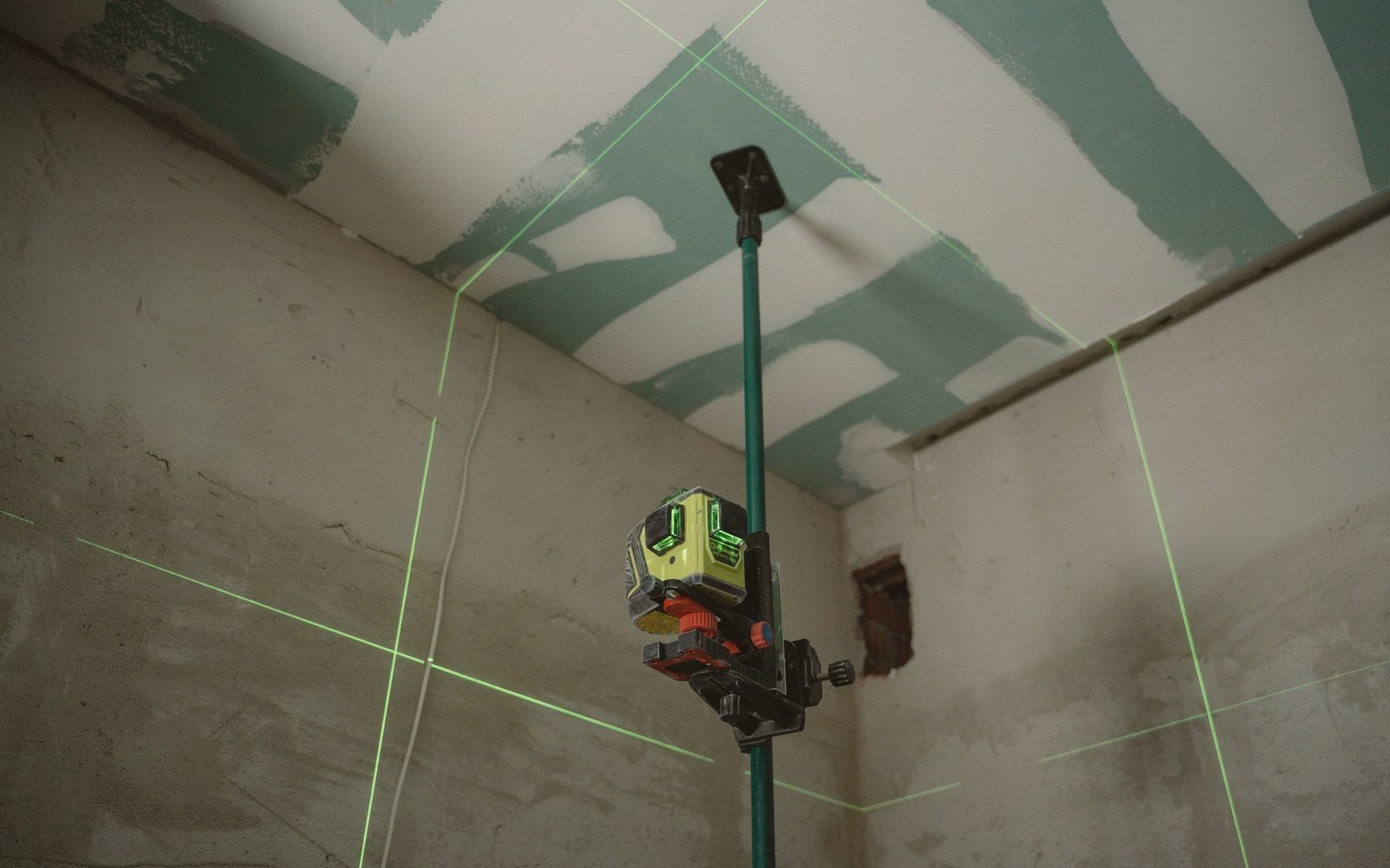 A laser level line across a gallery wall